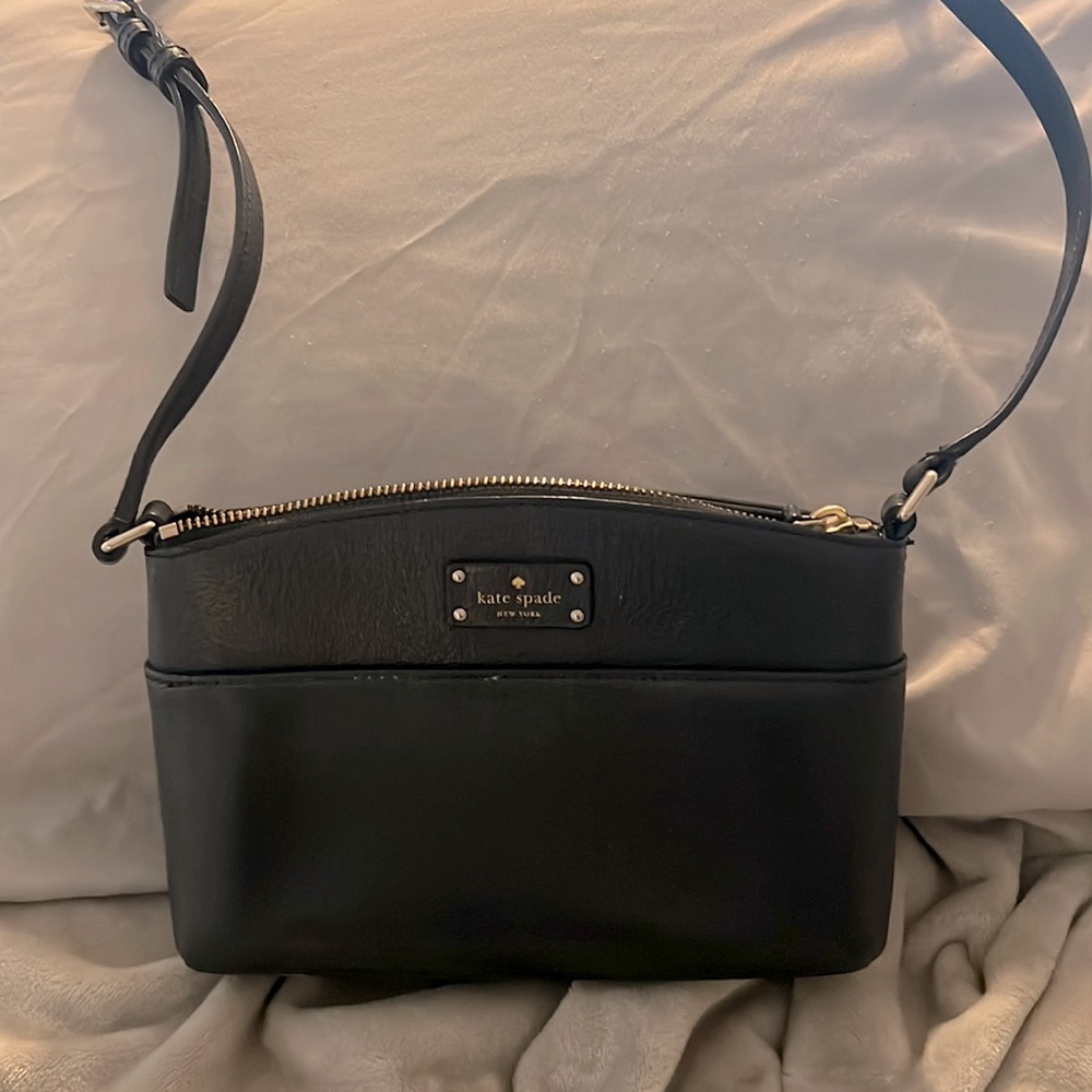 Kate Spade small shoulder purse. Black w/gold metal. Used but great condition.